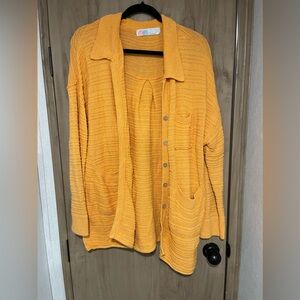 Tangerine colored Free People 100% cotton cardigan